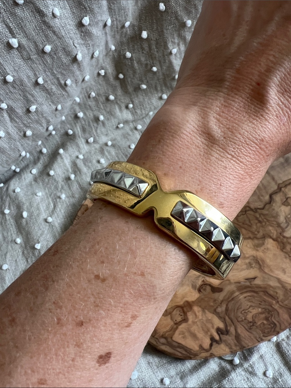 Two-Tone Gold and Silver Pyramid Stud Cuff Bracelet with spring hinge closure